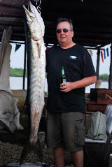 Angler Pete Baynham with 48lb Cuda