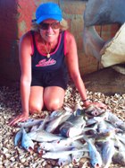 Karen with a variety of fish
